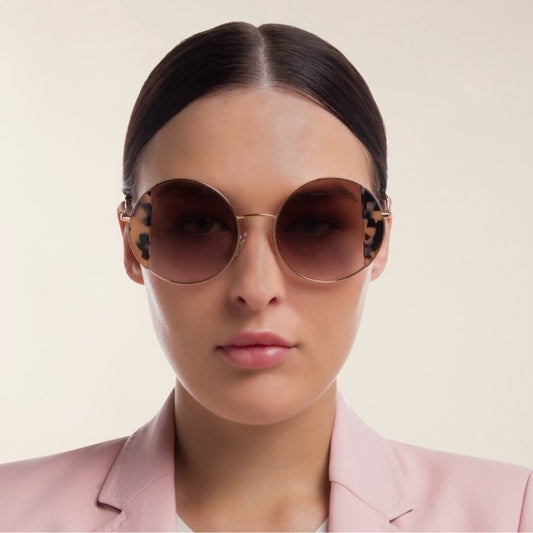 MIU MIU circular oversized sunglasses